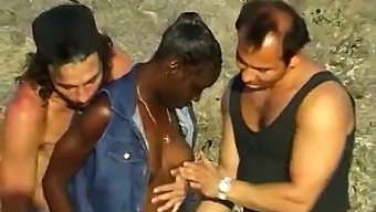 Two White Guys Pleasure A Black Woman At The Seaside In A Steamy 3some